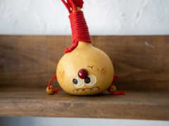 A smiling maraca