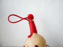 A smiling maraca